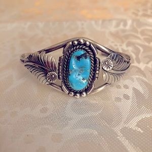 Navajo silver & turquoise bracelet with feather.